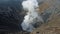 Photo of smoke volcano crater on Java island