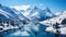 A photo of snow-capped peaks, with pristine alpine lakes as the background, during the winter season