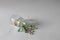 Photo of spilled transparant jar with colorful gems toy