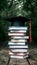 Photo Stack of books with mortarboard atop, symbolizing academic achievement and graduation success