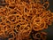 Photo of stacks of rubber bands against a black background