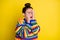 Photo of stressed scared brunette girl close face wear rainbow sweater isolated on bright yellow color background