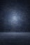 Photo studio portrait backdrop. Background painted scratch texture dark blue, cloud night with spot light. 3D rendering