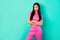 Photo of stunning gorgeous lady with folded arms wear fashionable urban outfit isolated on teal color background