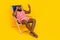 Photo stupor guy sit deckchair rest read news gadget wear red barefoot swim suit isolated shine color background