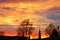 photo of the sunrise behind a bell tower, photo taken in Mogliano Veneto, Italy