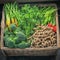 Photo Supermarket display basket filled with organic green veggies for selling