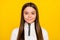 Photo of sweet charming preteen girl dressed white zipper shirt smiling  yellow color background