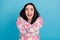 Photo of sweet excited young woman wear pink sweater open mouth embracing herself isolated blue color background