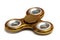 A photo taken on a gold colored fidget spinner set against a white backdrop