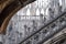 Photo taken high up in the terraces of Milan Cathedral / Duomo di Milano, showing the gothic architecture in detail.