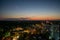 Photo taken at night, on the terrace of a hotel. Seaside holiday.a hotel, the sun set and the moon appeared. Somewhere in the