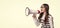 photo of teen girl announcer with megaphone, advertisement. teen girl announcer