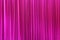 Photo Theatrical curtain of burgundy color of velvet.