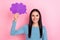 Photo of thoughtful charming young woman wear blue shirt holding mind cloud empty space isolated pink color background