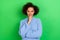 Photo of thoughtful pretty girlish woman with wavy hairstyle wear blue jumper hold fist on chin isolated on green color