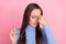 Photo of tired annoyed lady take off specs suffer head pain wear blue turtleneck isolated pink color background