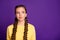 Photo of tricky mood lady long braids hairdo looking cunning empty space have crazy idea wear casual yellow pullover