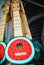 Photo of a tropical ukelele guitar in watermelon design.