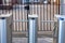 Photo of turnstiles on a modern city deserted street in spring sunny weather. checkpoint