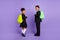 Photo of two african people children prepare for school wear rucksack uniform isolated purple color background