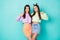 Photo of two beautiful lady friends cool youth clothes raise thumb fingers advising nice offer wear cropped green violet