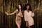 Photo of two dreamy inspired flirty ladies look side wear glossy outfit short dress  tinsel background