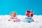 Photo of two small boy and girl cars driving present giftboxes loaded on roof xmas tradition romantic surprise greeting
