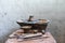 Photo of two small ceramics clay cup on table indoor old vintage