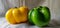 Photo of two yellow capsicum chillies close up