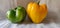 Photo of two yellow capsicum chillies close up