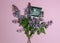 Photo ultrasound of a pregnant fetus on a background of a bouquet of lilacs