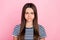 Photo of unhappy upset impressed girl wear striped outfit bloated cheeks isolated pink color background