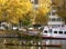 Photo from the urban landscape of autumn colors of foliage on the river spree in Berlin