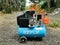 Photo of used single phase 2HP electric air compressor.