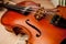 Photo of violin close-up. Close-up of cello strings, classical music concept. Detail of a violin