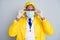 Photo of virologist doctor expert dark skin guy virology department professional wear epidemic clothes yellow coat hood
