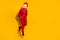 Photo of wacky freak guy jump hands pockets wear cock polygonal mask red tux isolated yellow color background