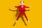 Photo of wacky panda guy jump have fun wear mask red tuxedo shoes isolated on yellow color background