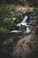 Photo of water flowing over the rocks