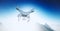 Photo White Matte Generic Design Modern Remote Control Drone with camera Flying in blue Sky under the Earth Surface