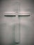 Photo white wooden christian cross bulging on a gray white background for use in religious symbols