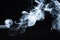 Photo of a wisp of smoke on a dark background