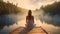 Photo of a woman enjoying the peacefulness of nature by sitting on a dock overlooking a serene lake