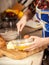 Photo of woman mixing eggs in glass bowl