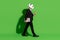 Photo of worker guy walk hold takeaway coffee cup laptop wear panda head black suit isolated on green color background