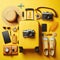 photo of yellow suitcase with traveler accessories on yellow background. birds eye view