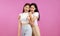 Photo of Young asian women in concept of lgbt Lesbian couple  on pink background