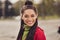 Photo of young attractive beaming afro brown hair girl happy positive smile enjoy autumn walk city center