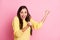 Photo of young beautiful excited crazy amazed ecstatic woman hold fists up scream isolated on pink color background